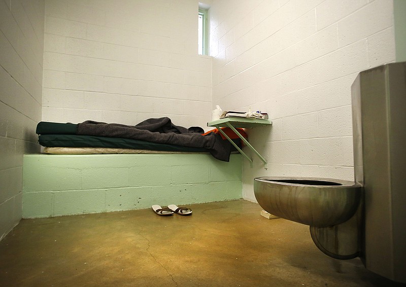 One of the cells at the Madison County Jail is shown May 15, 2014, in Huntsville. In 2014, the state’s 4th District Criminal Detention Facilities Review Committee found that the Madison County jail — which was built in the early 1980s to accommodate eight beds — didn’t comply with state standards.
(File Photo/NWA Democrat-Gazette)