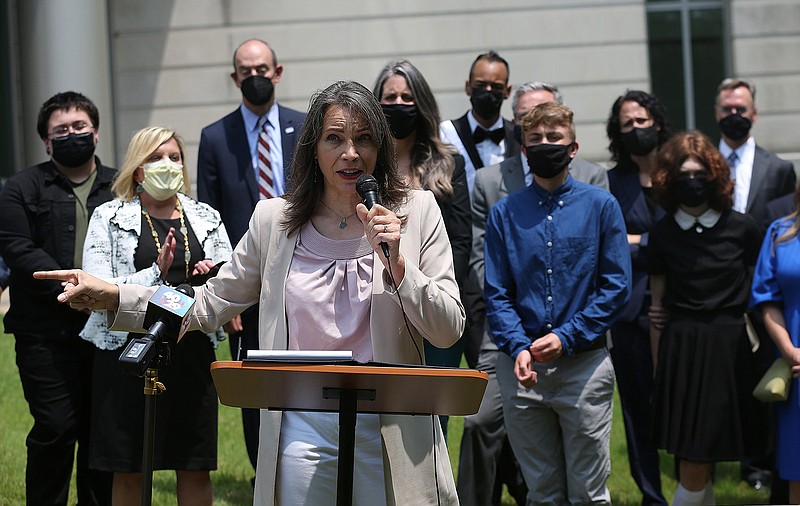 Washington County Justice of the Peace Evelyn Rios Stafford speaks July 21, 2021, during a press conference outside the Richard Sheppard Arnold United States Courthouse in Little Rock after a federal judge blocked Arkansas' transgender youth treatment ban. Rios Stafford is the first trans person elected to public office in Arkansas. 
(File Photo/Arkansas Democrat-Gazette/Thomas Metthe)