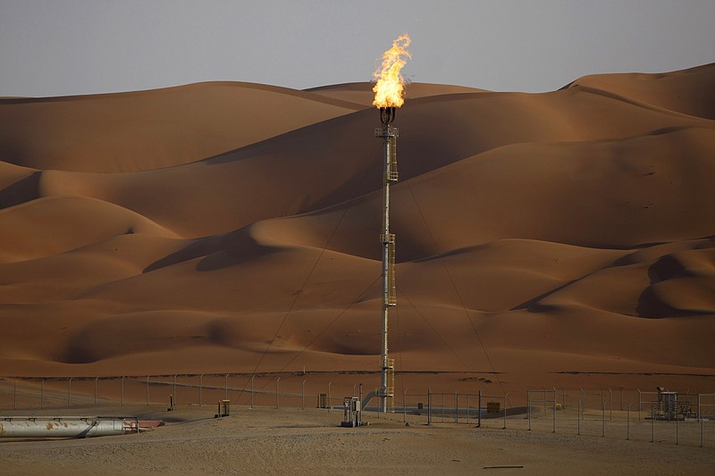 Flames burn off at an oil processing facility in Saudi Aramco's oilfield in the Rub' Al-Khali (Empty Quarter) desert in Shaybah, Saudi Arabia, on Oct. 2, 2018. MUST CREDIT: Bloomberg photo by Simon Dawson.