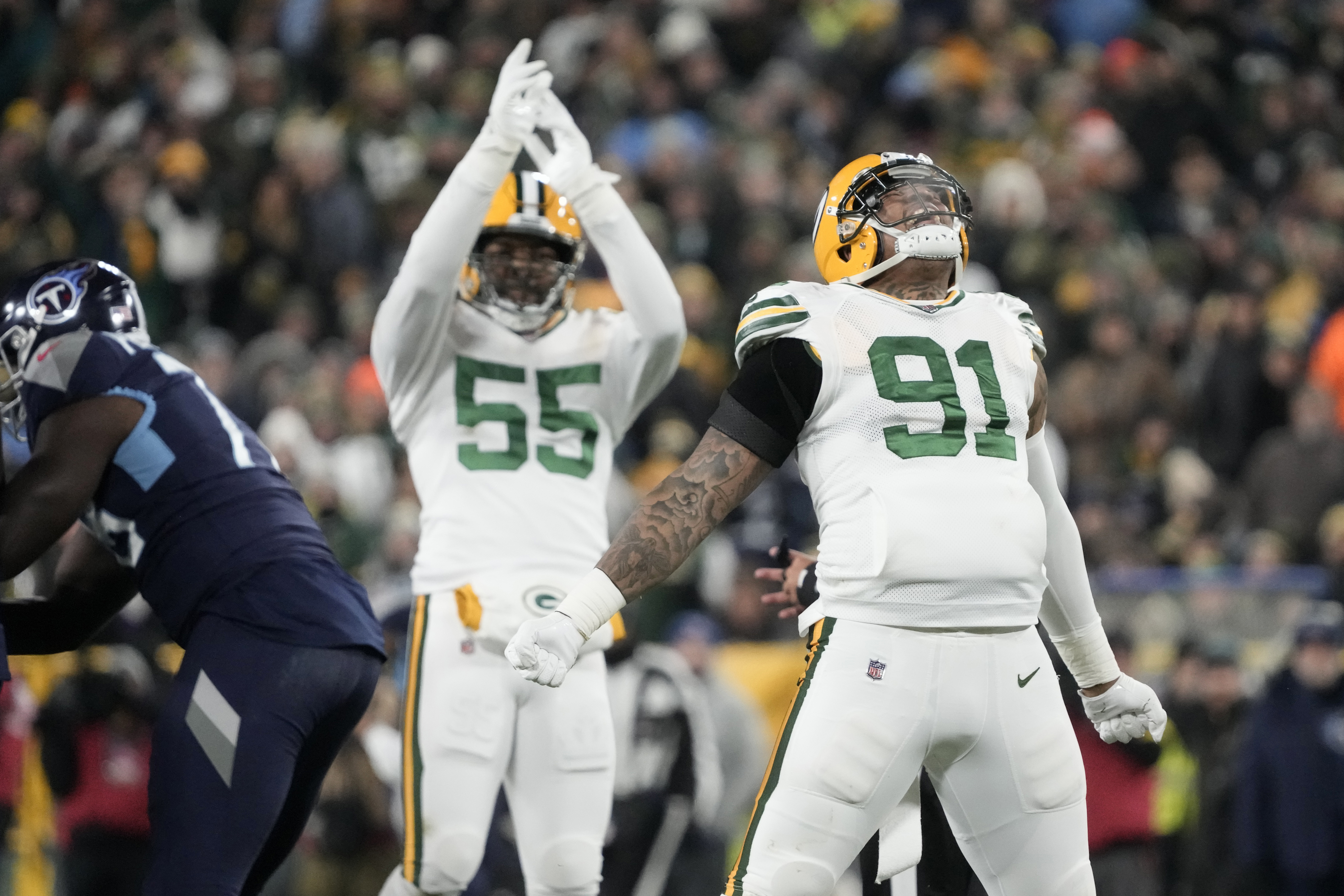 Green Bay Packers linebacker Kingsley Enagbare (55) rushes during