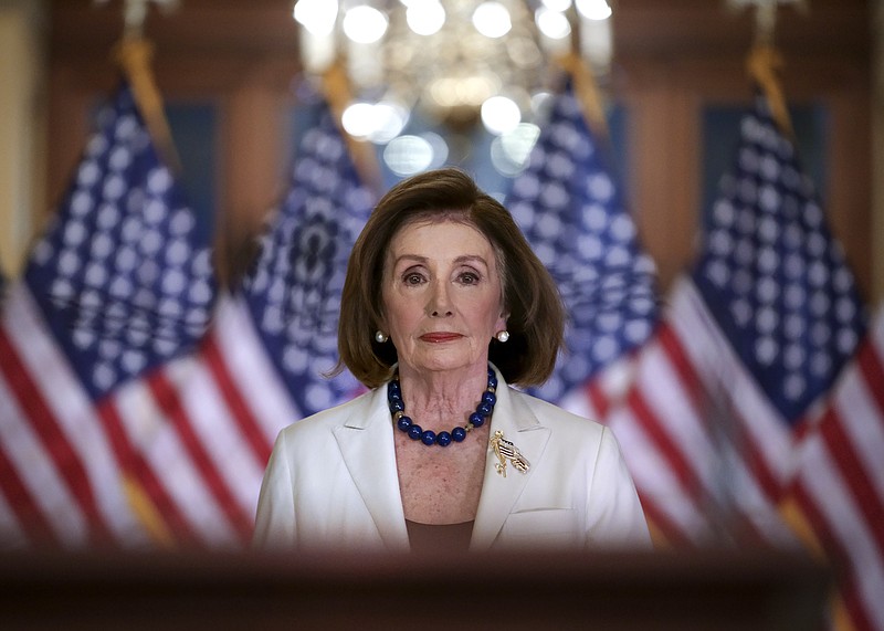 FILE - Speaker of the House Nancy Pelosi, D-Calif., arrives to make a statement at the Capitol in Washington, Dec. 5, 2019. Pelosi announced that the House is moving forward to draft articles of impeachment against President Donald Trump. (AP Photo/J. Scott Applewhite, File)