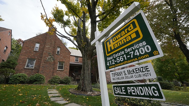 FILE - This is a home in Mount Lebanon, Pa., under contract, Oct. 17, 2022. Sales of previously occupied U.S. homes fell in September for the eighth month in a row, though the decline was the most modest yet since the housing market began to cool amid sharply higher mortgage rates. The National Association of Realtors said Thursday, Oct. 20, 2022 that existing home sales fell 1.5% last month from August to a seasonally adjusted annual rate of 4.71 million. (AP Photo/Gene J. Puskar, file)