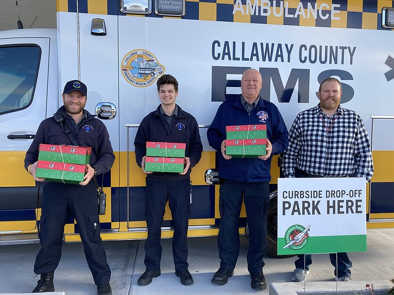 Submitted photo: 
Callaway County EMS staff pose for a photo with the shoeboxes they donated to Operation Christmas Child. A total of 8 shoeboxes were donated to the project.