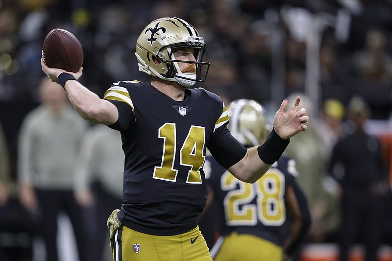 Dalton thrives, Stafford leaves, as Saints top Rams, 27-20