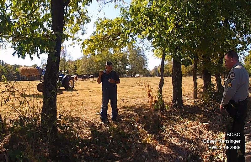 In this shot from a Benton County sheriff’s deputy’s body camera, two sheriff’s deputies talk with Nelson Amos of Decatur on Oct. 15 upon responding to a call that Amos was firing guns on his property. Less than an hour later, Amos was shot and killed during a subsequent confrontation with law enforcement officers.

(Submitted Photo)