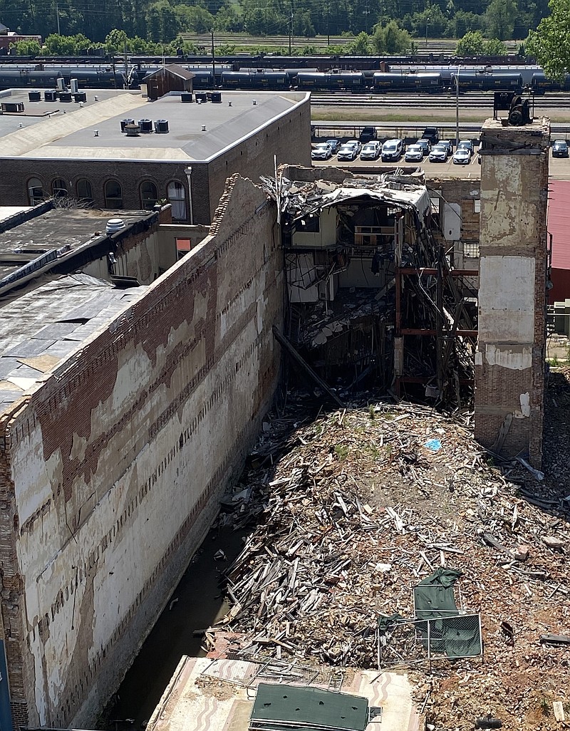 The remnants of the Regency House building are seen in this May 2022 photo. The Board of Directors of Texarkana, Ark., on Monday, Nov. 21, 2022, approved by a 4-2 vote a $450,000 contract to complete demolition of the building, which is at 110 E. Broad St. (Staff photo by Stevon Gamble)