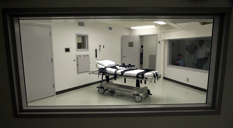 ** FILE **  Alabama's  lethal injection chamber at Holman Correctional Facility in Atmore, Ala., is pictured in this Oct. 7, 2002 file photo. Anti-death penalty forces have gained momentum in the past few years, with a moratorium in Illinois, court disputes over lethal injection in more than a half-dozen states and progress toward outright abolishment in New Jersey. (AP Photo/Dave Martin, File)