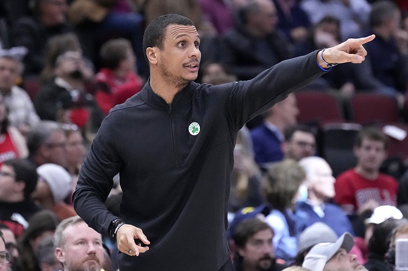 Boston Celtics interim head coach Joe Mazzulla directs his team during the second half of an NBA basketball game against the Chicago Bulls Monday, Nov. 21, 2022, in Chicago. The Bulls won 121-107. (AP Photo/Charles Rex Arbogast)