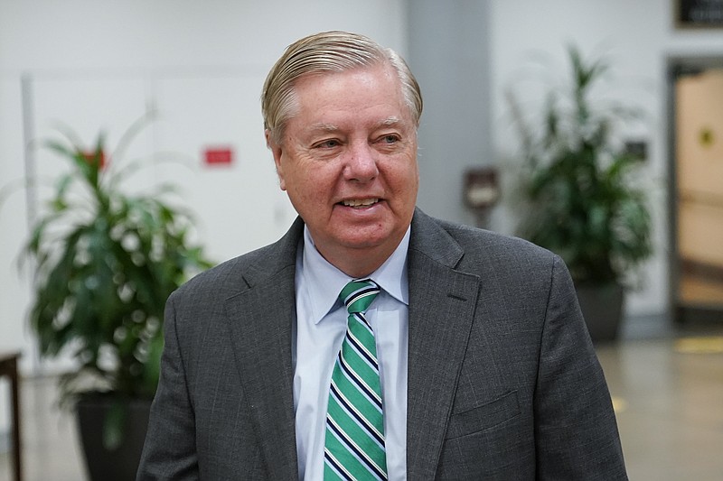 Sen. Lindsey Graham, R-S.C., walks on Capitol Hill in Washington, Tuesday, Nov. 15, 2022. (AP Photo/Patrick Semansky)