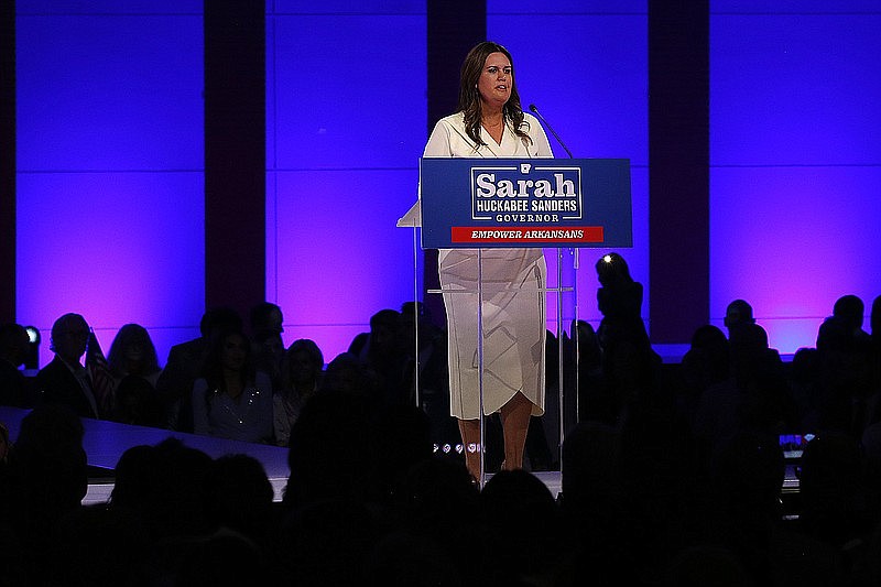 “I know it will be the honor of a lifetime to serve as Arkansas’ 47th governor and the first female governor of the state,” Sarah Huckabee Sanders said Tuesday night at the Statehouse Convention Center in Little Rock. (Arkansas Democrat-Gazette/Thomas Metthe)