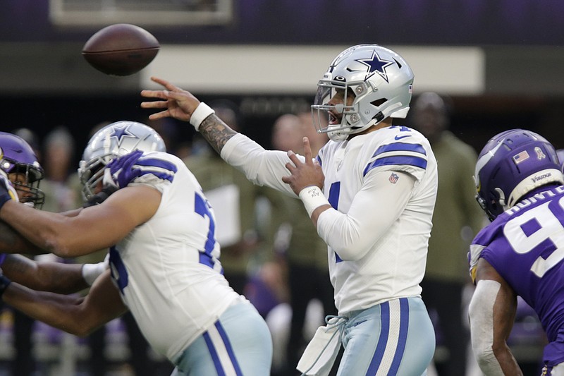 Dallas Cowboys quarterback Dak Prescott throws a pass during the first half against the Minnesota Vikings Sunday in Minneapolis. - Photo by Andy Clayton-King of The Associated Press