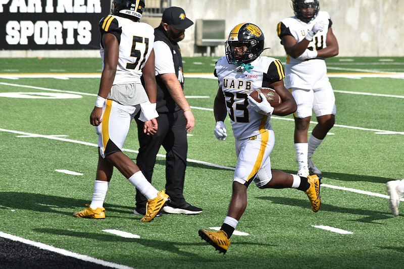 UAPB running back Kayvon Britten warms up before Thursday's game against Alabama State in Montgomery. (Pine Bluff Commercial/I.C. Murrell)