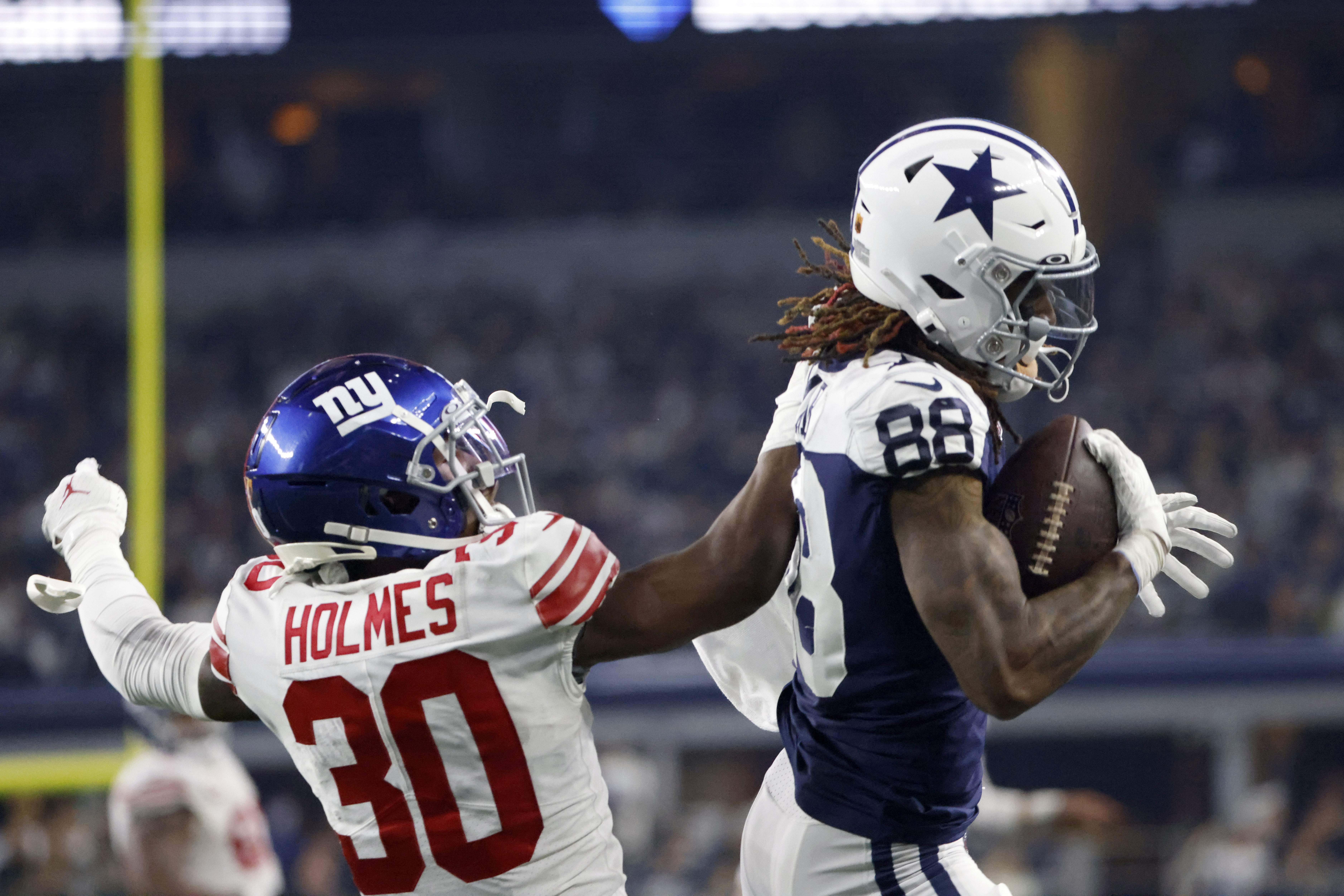 Cowboys TEs celebrate 4th-quarter touchdown with whack-a-mole in Salvation  Army kettle