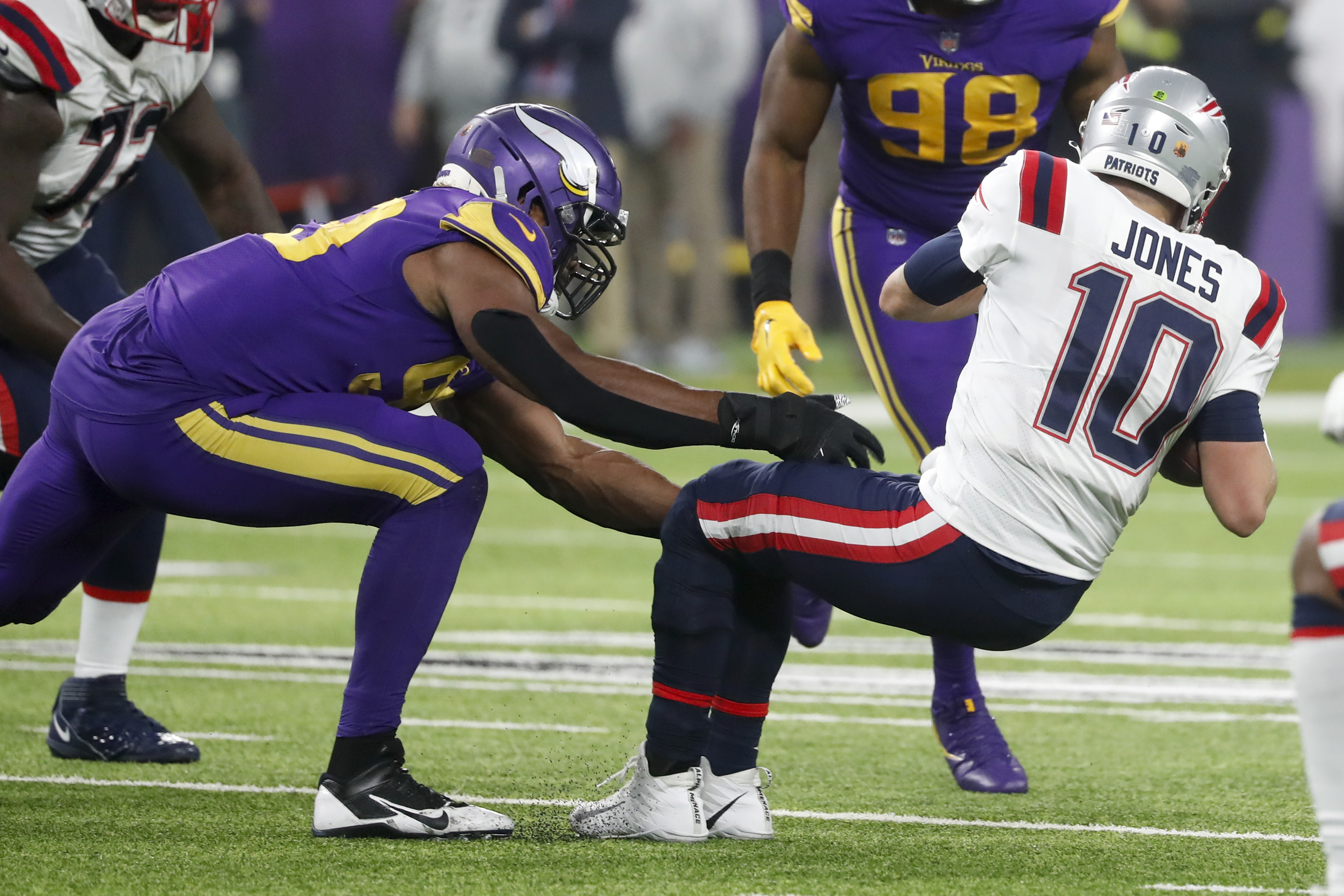 Minnesota Vikings punter Ryan Wright (14) punts against the