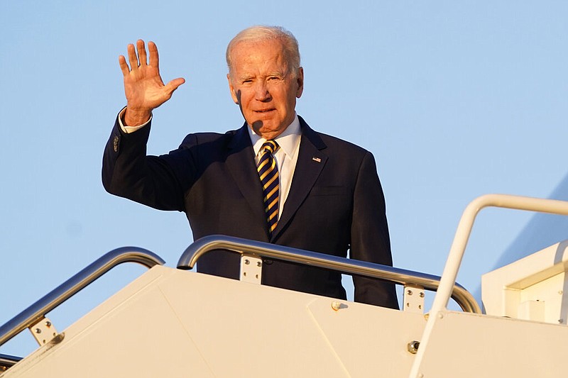 President Joe Biden waves as he boards Air Force One, Monday, Nov. 21, 2022, at Andrews Air Force Base, Md. Biden is traveling to Marine Corps Air Station Cherry Point in Havelock, N.C., to participate in Thanksgiving festivities with members of the military and their families. (AP Photo/Patrick Semansky)