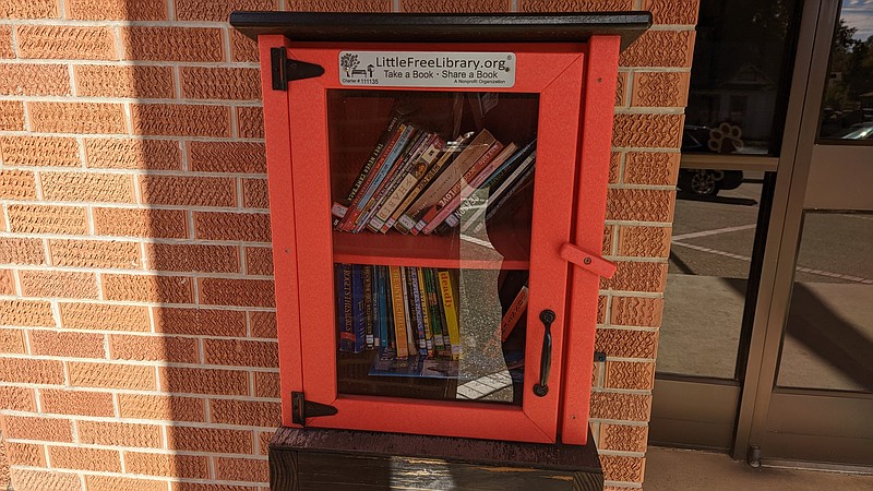 The Little Free Library in front of Magnolia Middle School can be seen full of books. (Joshua Turner / Banner News)