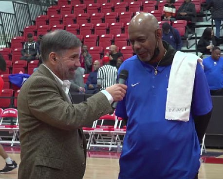 Oklahoma City Southeast coach Walter Brewer talks with Fort Smith Athletic Director Michael Beaumont on Nov. 19 following Southeast's victory over Southside at the Big Show Tip Off Classic on Nov. 19. 
(Submitted photo)