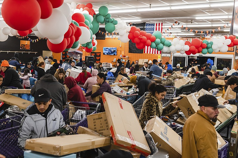 Shoppers at the El Remate Discount store on Black Friday in El Paso, Texas on Nov. 25, 2022. The holiday shopping season is the most important time in the retail industry, a period when many companies make a significant amount of their money for the year. (Justin Hamel/The New York Times)