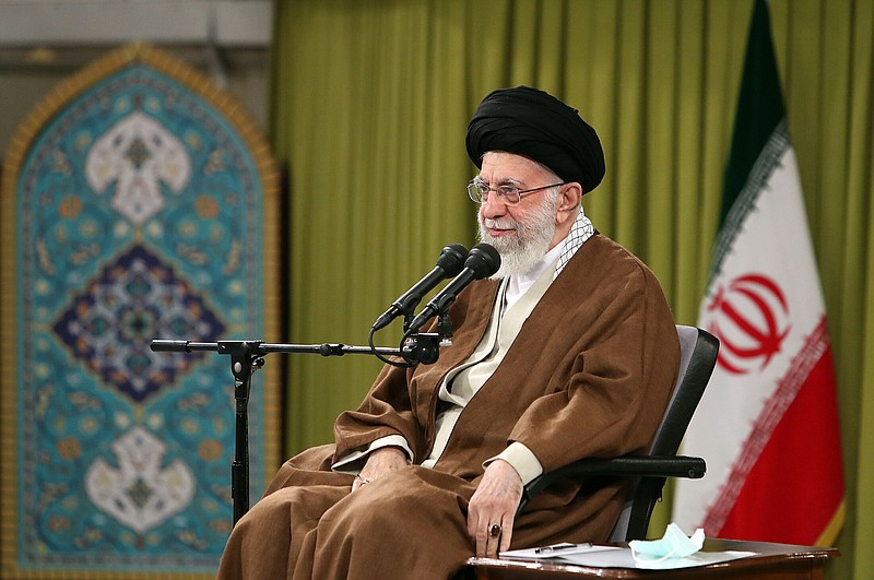 In this picture released by the official website of the office of the Iranian supreme leader, Supreme Leader Ayatollah Ali Khamenei speaks during a meeting with a group of Basij paramilitary force in Tehran, Iran, Saturday, Nov. 26, 2022. Iran's supreme leader praised paramilitary volunteers tasked with quashing dissent on Saturday in a televised address as dozens of eye doctors warned that a rising number of demonstrators have been blinded by security forces during anti-government protests. The Basij have taken a leading role in clamping down on demonstrations that began Sept. 17, ignited by the death of a young woman while in the custody of Iran's morality police. (Office of the Iranian Supreme Leader via AP)