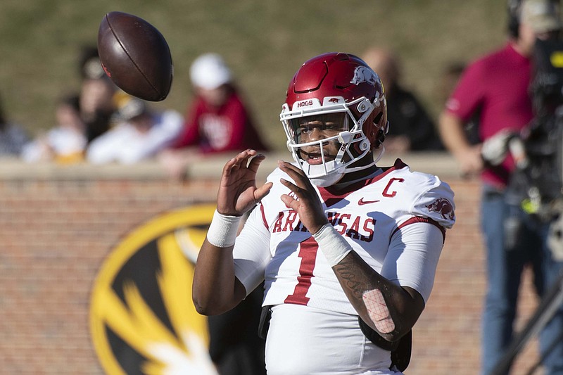 Arkansas quarterback KJ Jefferson warms up before the start of a game against Missouri in Columbia, Mo. - Photo by L.G. Patterson of The Associated Press