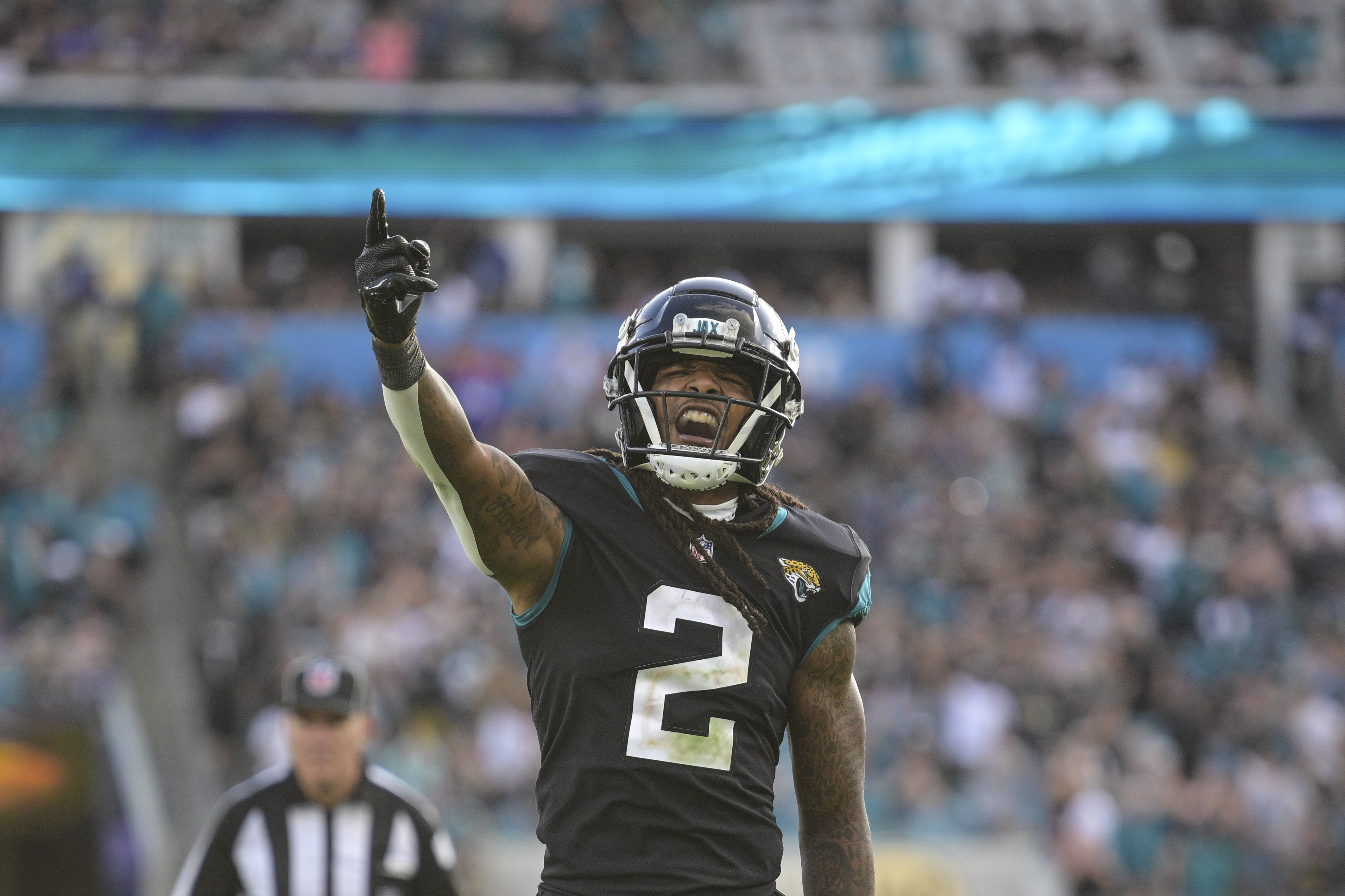 Jacksonville, FL, USA. 19th Sep, 2021. Jacksonville Jaguars wide receiver  Marvin Jones Jr. (11) celebrates with Jacksonville Jaguars quarterback  Trevor Lawrence (16) after a touch down during 1st half NFL football game