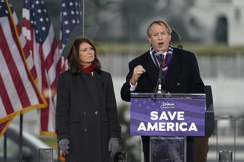 FILE - Texas Attorney General Ken Paxton speaks at a rally in support of President Donald Trump called the "Save America Rally" in Washington on Jan. 6, 2021. Florida, Georgia, Texas and Virginia all started new law enforcement units to investigate voter fraud in this year’s elections based on former President Donald Trump’s lies about the 2020 presidential contest. So far, those units seem to have produced more headlines than actual cases.  (AP Photo/Jacquelyn Martin, File)