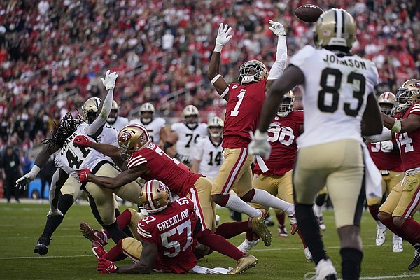 San Francisco 49ers celebrate after middle linebacker Fred Warner (54)  intercepted a pass in th …