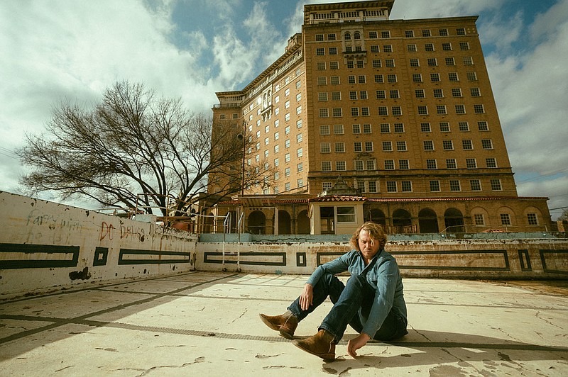 William Clark Green pauses in front of the Baker Hotel in Mineral Wells, Texas. Green wrote a song and filmed a video inside the hotel, which the Arkansas Gazette reports is a close copy of the Arlington Hotel in Hot Springs. Green performs at 8 p.m. Dec. 2 at TempleLive in Fort Smith. Tickets are $15-$29. (Courtesy Photo/Zack Knudsen)