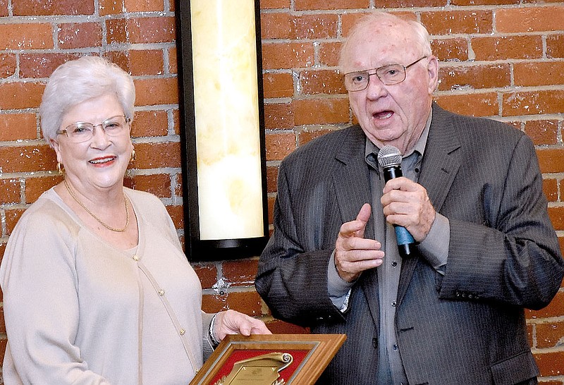 Mike Capshaw/Herald-Leader

Pat Allen (left) and here husband, Pete Allen, were honored with a plaque during their induction into the Bill Foreman Hall of Fame during an event hosted by the Boys and Girls Club of Western Benton County at 28 Springs on Tuesday.