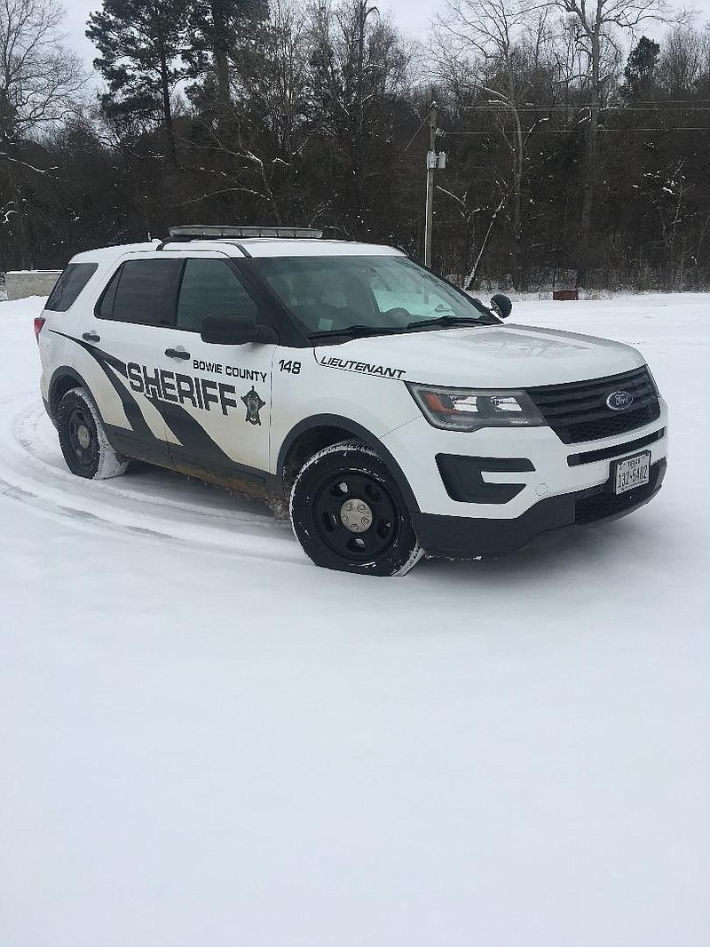 A Bowie County Sheriff's Office Ford Explorer is seen in this 2021 photo. The SUVs were used to transport employees to and from work after a heavy snowfall. Commissioners on Monday, Nov. 28, 2022, agreed to purchase five 2023 Ford Explorers for the Sheriff's Office. (Photo courtesy of Bowie County Sheriff's Office)