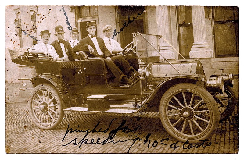 Pine Bluff, 1910: “Pinched for speeding: $10.00 and costs.” A policeman seems to be in the rear seat of the Locomobile, made by a company that started in 1899 with steam-powered cars.