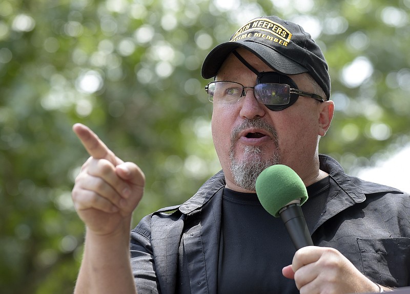 FILE - Stewart Rhodes, founder of the citizen militia group known as the Oath Keepers speaks during a rally outside the White House in Washington, on June 25, 2017. (AP Photo/Susan Walsh, File)