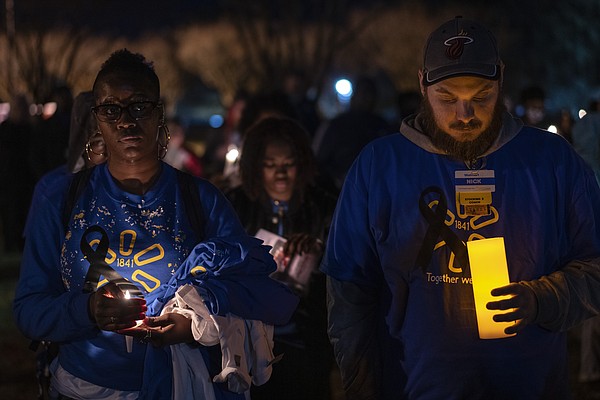 City holds vigil, honors 6 dead in Walmart shooting - Vimarsana News