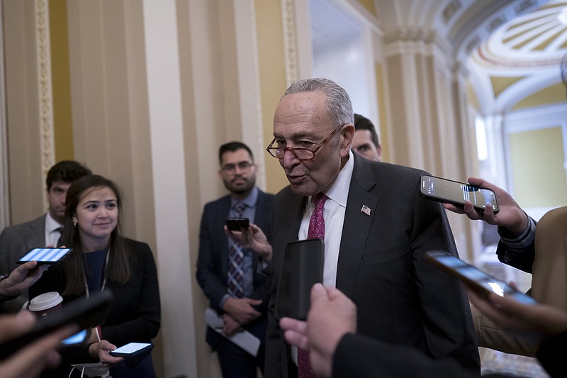 Senate Majority Leader Chuck Schumer, D-N.Y., speaks with reporters before Senate Democrats move forward on legislation to protect same-sex and interracial marriage, at the Capitol in Washington, Wednesday, Nov. 16, 2022. (AP Photo/J. Scott Applewhite)