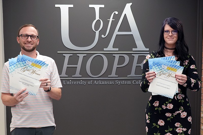 From left, Casey Curtis, University of Arkansas Hope-Texarkana communications coordinator, and Caley Pennington, graphic and web design coordinator, show off the Education Digital Marketing Awards the school recently won. (Submitted photo)