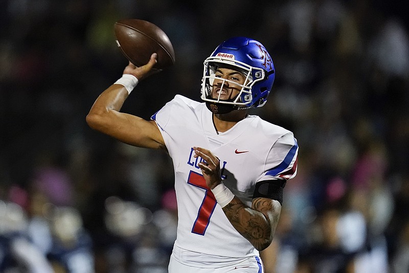 Los Alamitos High School quarterback Malachi Nelson throws during a high school football game against Newport Harbor High School Sept. 30 in Newport Beach, Calif. - Photo by Ashley Landis of The Associated Press