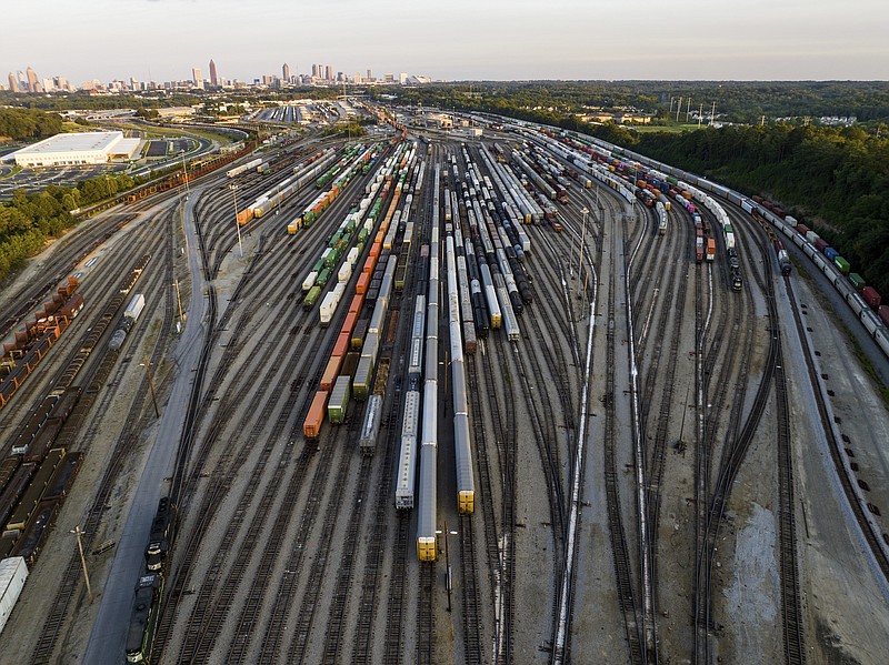 FILE - Freight train cars sit in a Norfolk Southern rail yard on Sept. 14, 2022, in Atlanta. Business groups are increasing the pressure on lawmakers to intervene and block a railroad strike before next month's deadline in the stalled contract talks. A coalition of more than 400 business groups sent a letter to Congressional leaders Monday, Nov. 28, 2022 urging them to step in because of fears about the devastating potential impact of a strike that could force many businesses to shut down. (AP Photo/Danny Karnik, File)