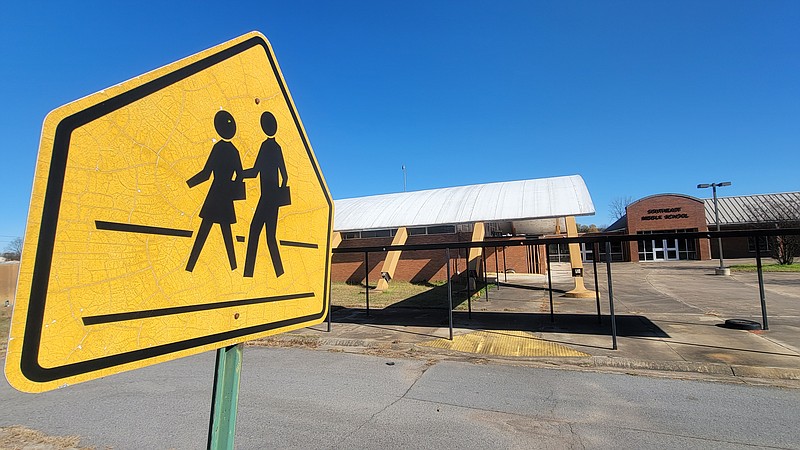 Southeast Middle School on South Ohio Street is pictured behind a school crossing sign Wednesday. (Pine Bluff Commercial/I.C. Murrell)