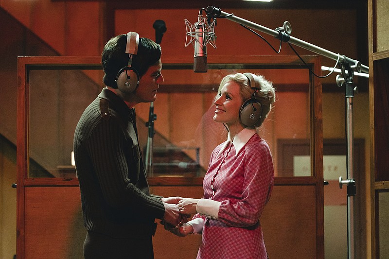 This image released by Showtime shows Michael Shannon as George Jones, left, and Jessica Chastain as Tammy Wynette in a scene from "George & Tammy," premiering Dec. 4. (Dana Hawley/Showtime via AP)