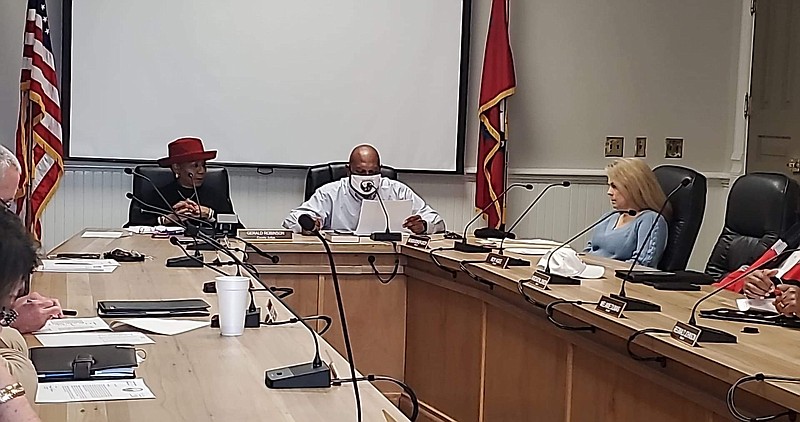 Pine Bluff Mayor Shirley Washington, Jefferson County Judge Gerald Robinson and Jefferson County Office of Emergency Management Director Karen Blevins discuss the need for correct addresses for the county's 911 system to work properly. (Pine Bluff Commercial/Suzi Parker)