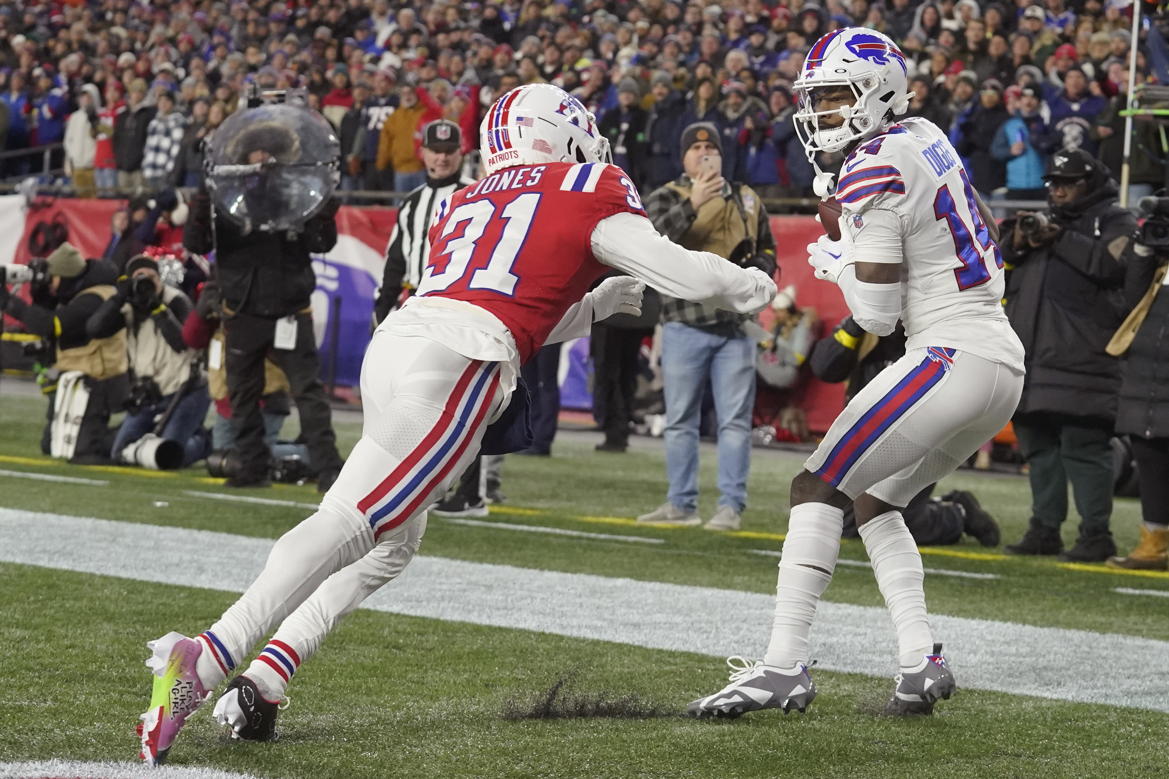 Buffalo Bills tackle Spencer Brown (79) walks off the field following a win  in an NFL football game against the New England Patriots, Sunday, Dec. 26,  2021, in Foxborough, Mass. (AP Photo/Stew