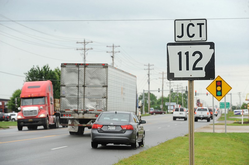 Traffic flows May 29, 2015, along Henri de Tonti Boulevard in Tontitown near the intersection with Arkansas 112. 
(File Photo/NWA Democrat-Gazette/Andy Shupe)