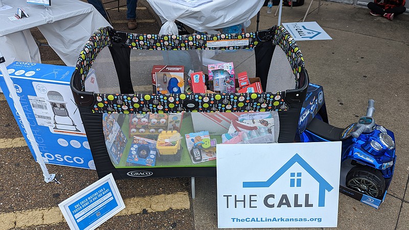 Donations for The Call sit in a baby playpen. (Joshua Turner / The Banner News)