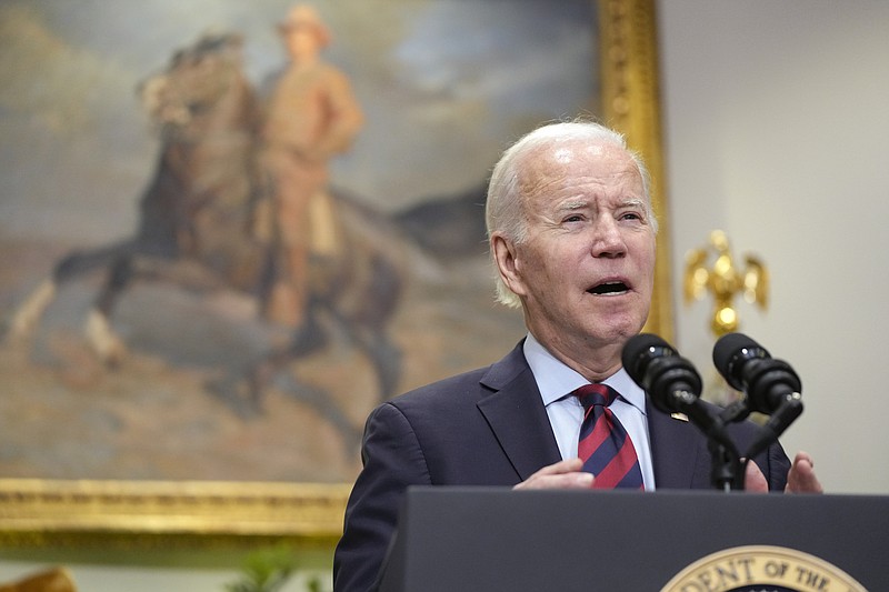 President Joe Biden speaks before signing H.J.Res.100, a bill that aims to avert a freight rail strike, in the Roosevelt Room at the White House, Friday, Dec. 2, 2022, in Washington. The measure passed Thursday by the Senate and Wednesday by the House binds rail companies and workers to a proposed settlement that was reached between the rail companies and union leaders in September. (AP Photo/Manuel Balce Ceneta)