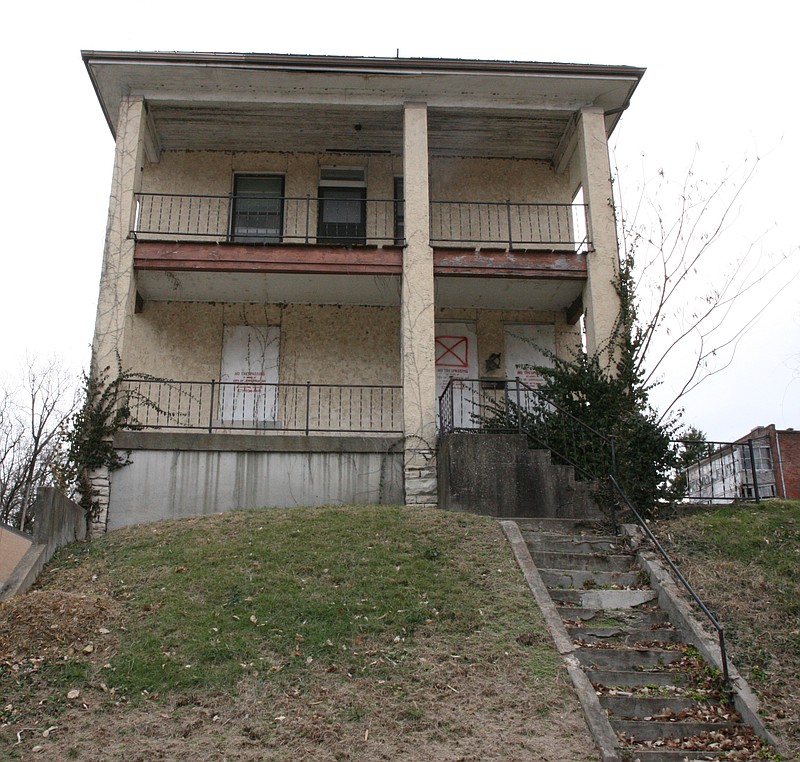 The two-story home at 109 Adams St. in Jefferson City was built sometime in the early 1900s. (News Tribune December 2022 photo)