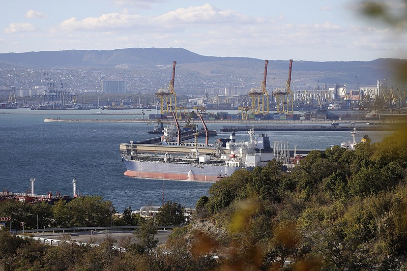 An oil tanker is moored at the Sheskharis complex, part of Chernomortransneft JSC, a subsidiary of Transneft PJSC, in Novorossiysk, Russia, Tuesday, Oct. 11, 2022, one of the largest facilities for oil and petroleum products in southern Russia. The European Union reached a deal Friday for a $60-per-barrel price cap on Russian oil, a key step as Western sanctions aim to reorder the global oil market to prevent price spikes and starve President Vladimir Putin of funding for his war in Ukraine. (AP Photo, File)