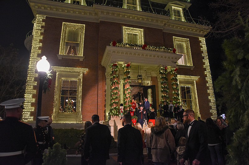 Julie Smith/News Tribune
Hundreds of people stood in line Friday night as Gov. Mike Parson and First Lady Teresa Parson hosted an event at the Governor's Mansion night to kick off the Christmas festivities in downtown Jefferson City. The governor flipped a big lever to turn on the lights to the tree and to the mansion that will be lit until the end of December.