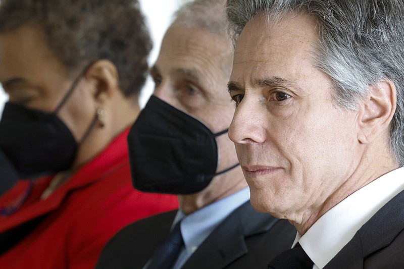 Secretary of State Antony Blinken, from right, Dr. Anthony Fauci, Director of the National Institute of Allergy and Infectious Diseases, and Rep. Barbara Lee, D-Calif., attend a World AIDS Day event hosted by the Business Council for International Understanding in Washington, Friday, Dec. 2, 2022. (Jonathan Ernst/Pool Photo via AP)