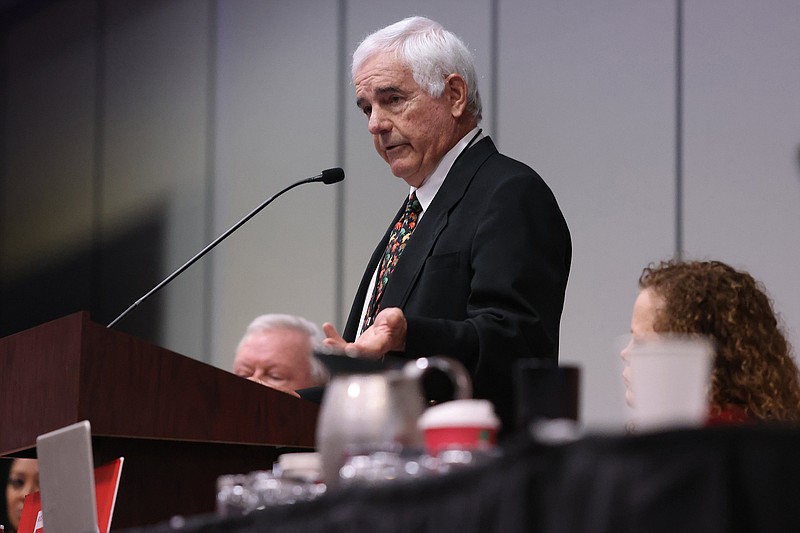 Republican Party of Arkansas rules chairman Steve Lux, center, addresses the audience during a state committee meeting at the Embassy Suites hotel in Little Rock on Saturday, Dec. 3, 2022. (Arkansas Democrat-Gazette/Colin Murphey)