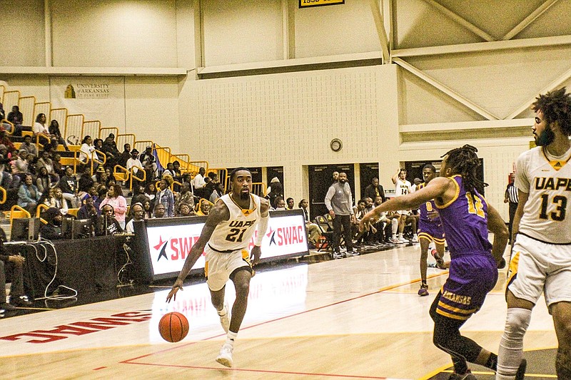 The Golden Lions Shaun Doss goes for a goal in Saturday's game against the Arkansas Baptist College Buffaloes at H.O. Clemmons Arena. (Special to the Pine Bluff Commercial)